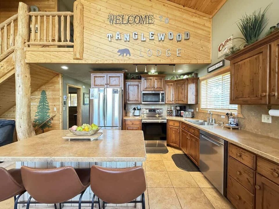 Full kitchen with appliances, cookware, dishes, silverware, and basic spices.