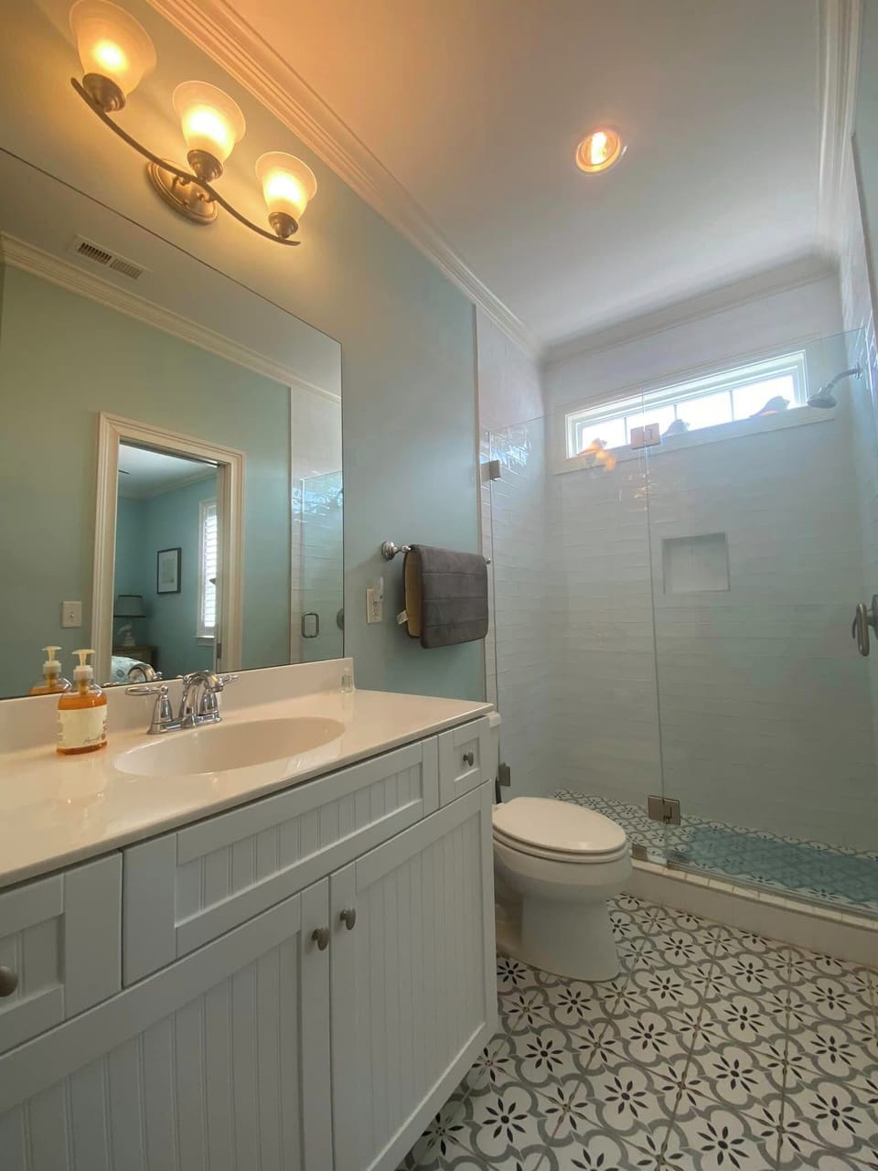 MAIN LEVEL/ 2ND FLOOR FULL BATH CONNECTED TO BEDROOM. TILED FLOORS & SHOWER