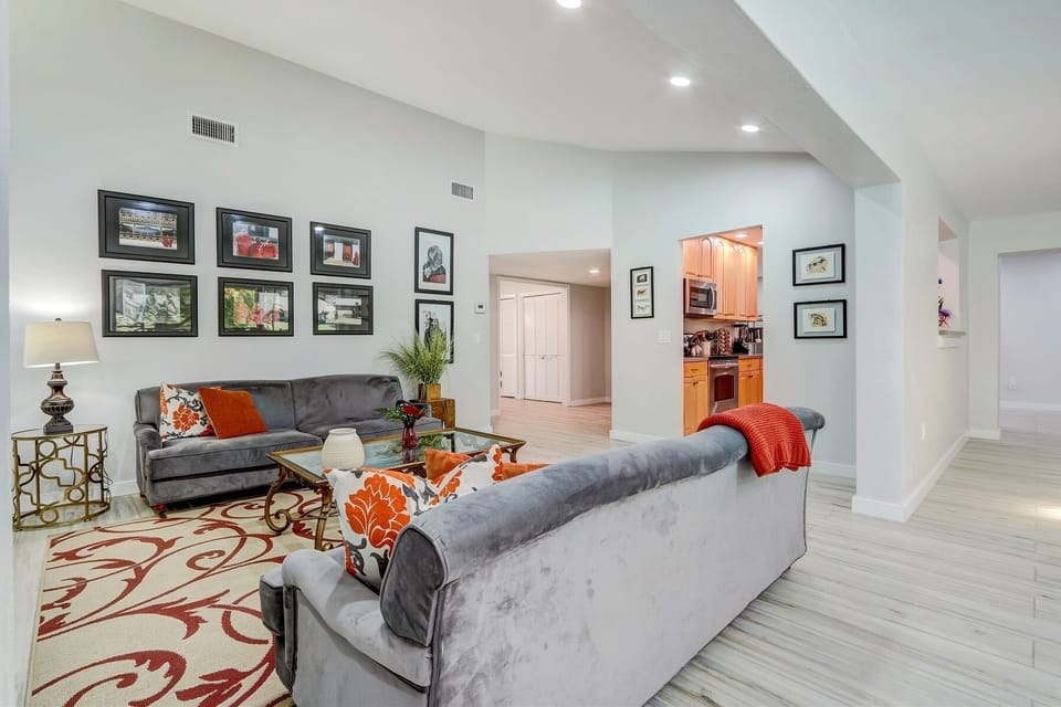 Two soft fabric sofas accommodate large family gatherings