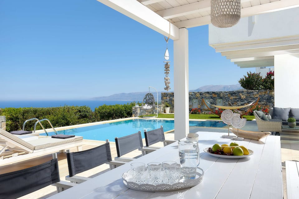 dining area outside next to the pool