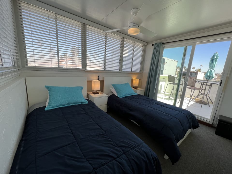 Twin bedroom, walk through second bedroom and hallway to get here.