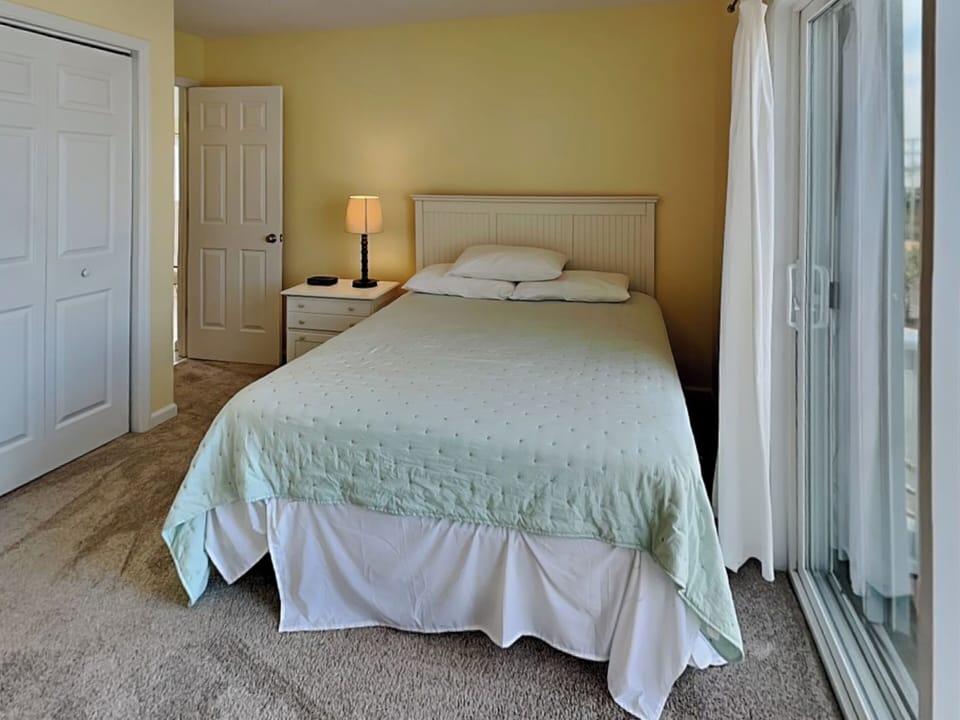 Fourth Bedroom - Queen Bed, Balcony Access + Shared Ensuite Bathroom - Second Floor