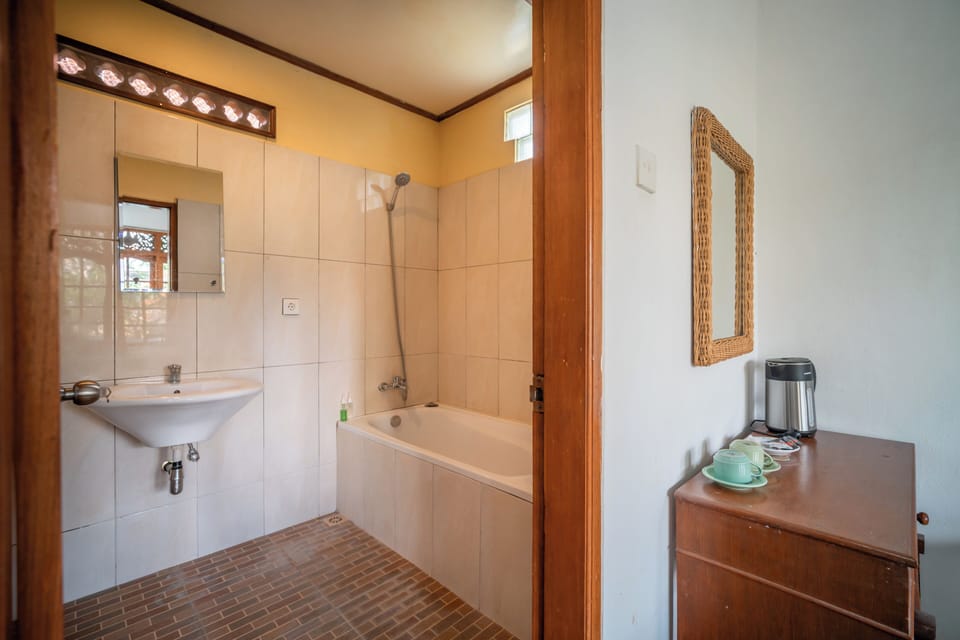 Superior Double | Bathroom | Shower, free toiletries, towels, soap