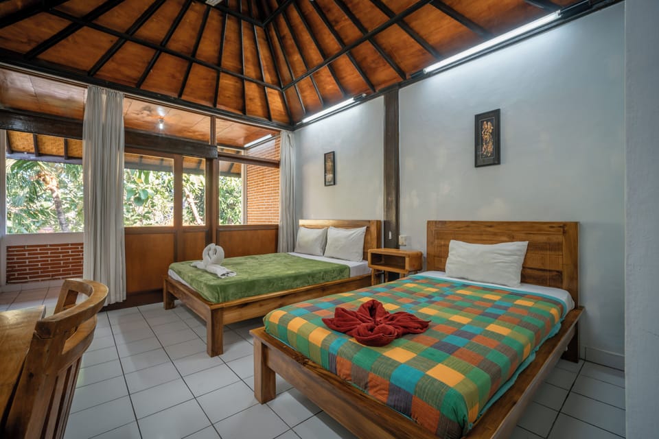 Family Room | In-room safe, desk, WiFi (free), bed sheets