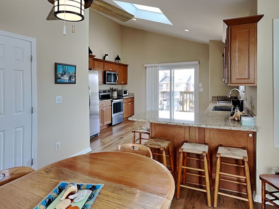 Dining and Kitchen - Breakfast Bar Seating For Four