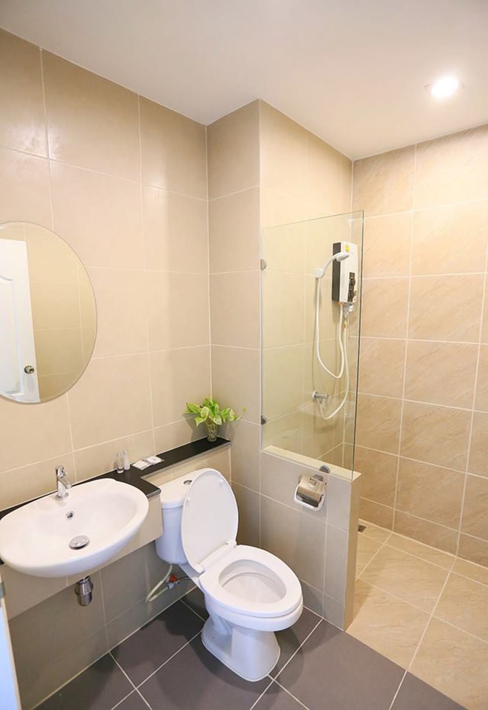 Shower, free toiletries, hair dryer, slippers