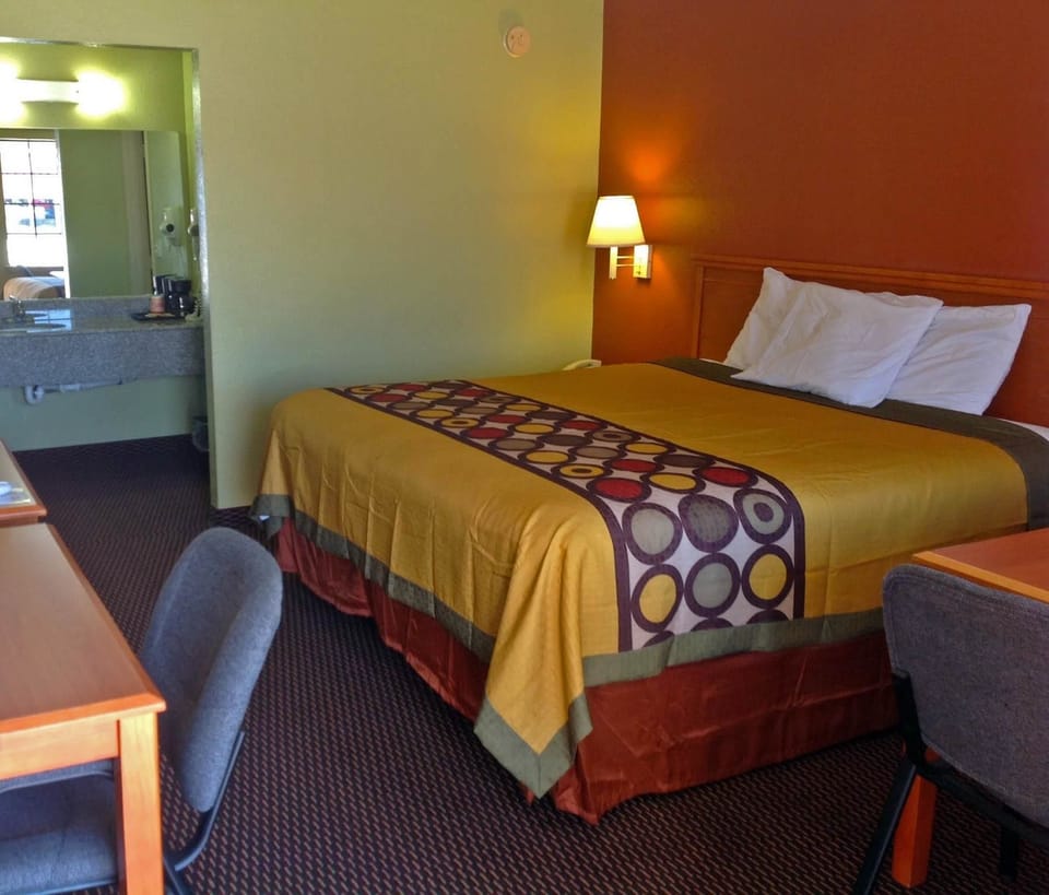 Desk, blackout drapes, iron/ironing board, free WiFi