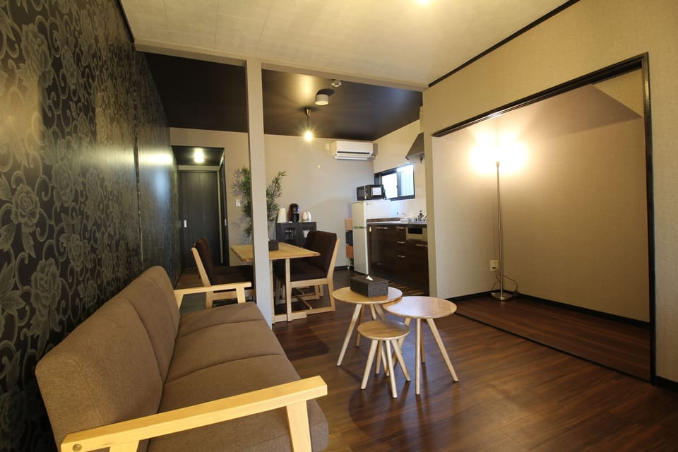Traditional Townhome, Multiple Beds, Kitchen | Living area | Flat-screen TV