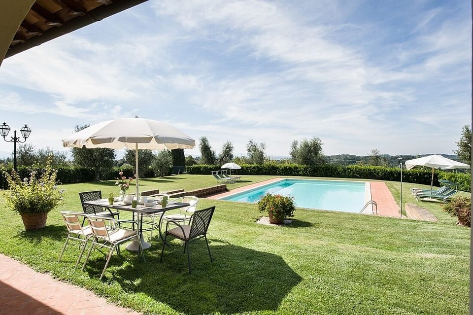 Back garden and swimming pool