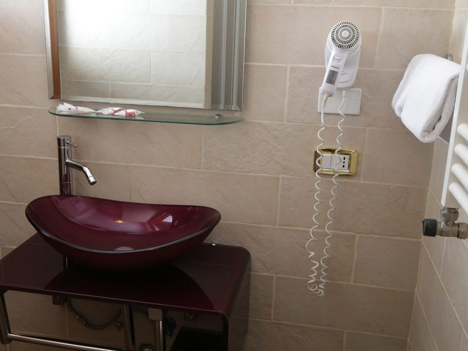 Shower, free toiletries, hair dryer (on request), towels