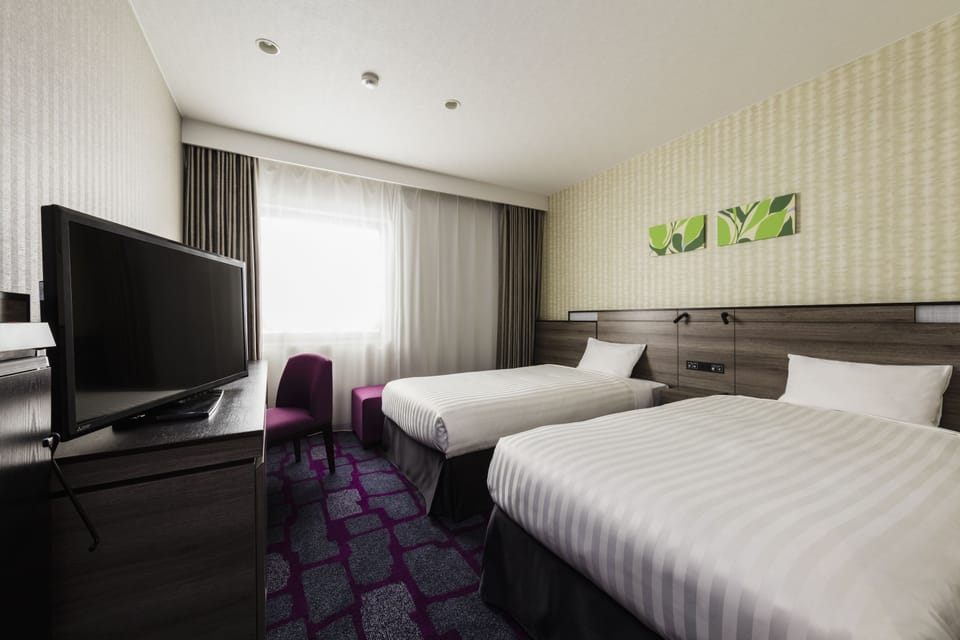 Blackout drapes, free WiFi, bed sheets