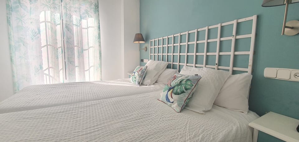 Twin Room | Blackout drapes, free WiFi, bed sheets