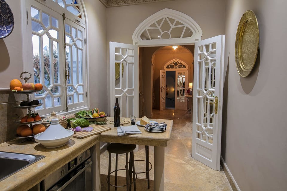 Presidential Suite, 2 Bedrooms | Private kitchen | Coffee/tea maker, electric kettle, highchair