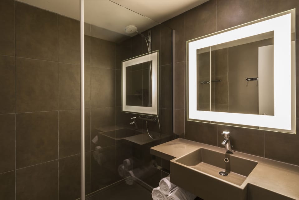 Eco-friendly toiletries, hair dryer, towels