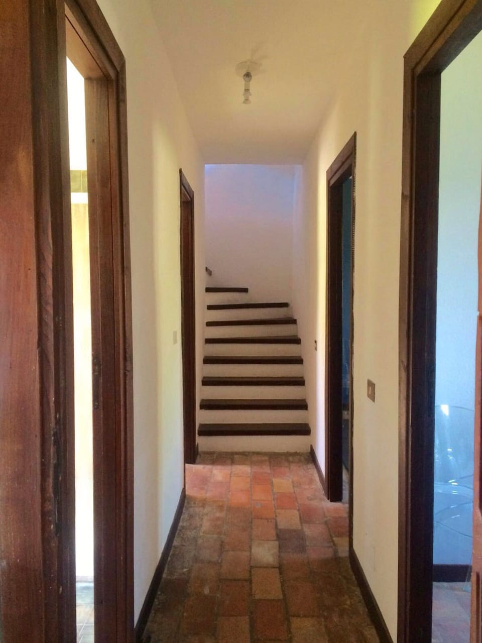 Corridor With Two Bedroom and Bathrooms Leading to Upstairs Bedroom and Terrace