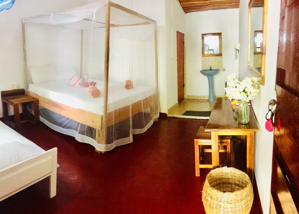 Deluxe Triple Room, Smoking, Garden Area | 1 bedroom, in-room safe, desk, free WiFi