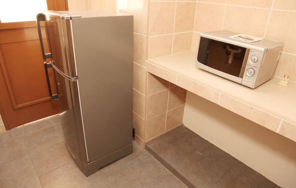 Coffee/tea maker, fridge, microwave, electric kettle