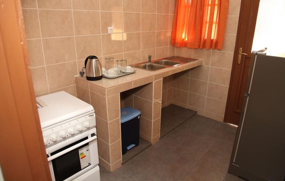 Standard Quadruple Room, 2 Bedrooms | Private kitchenette | Coffee/tea maker, fridge, microwave, electric kettle