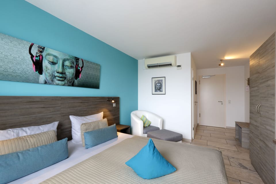 Double Room | Minibar, in-room safe, desk, cribs/infant beds