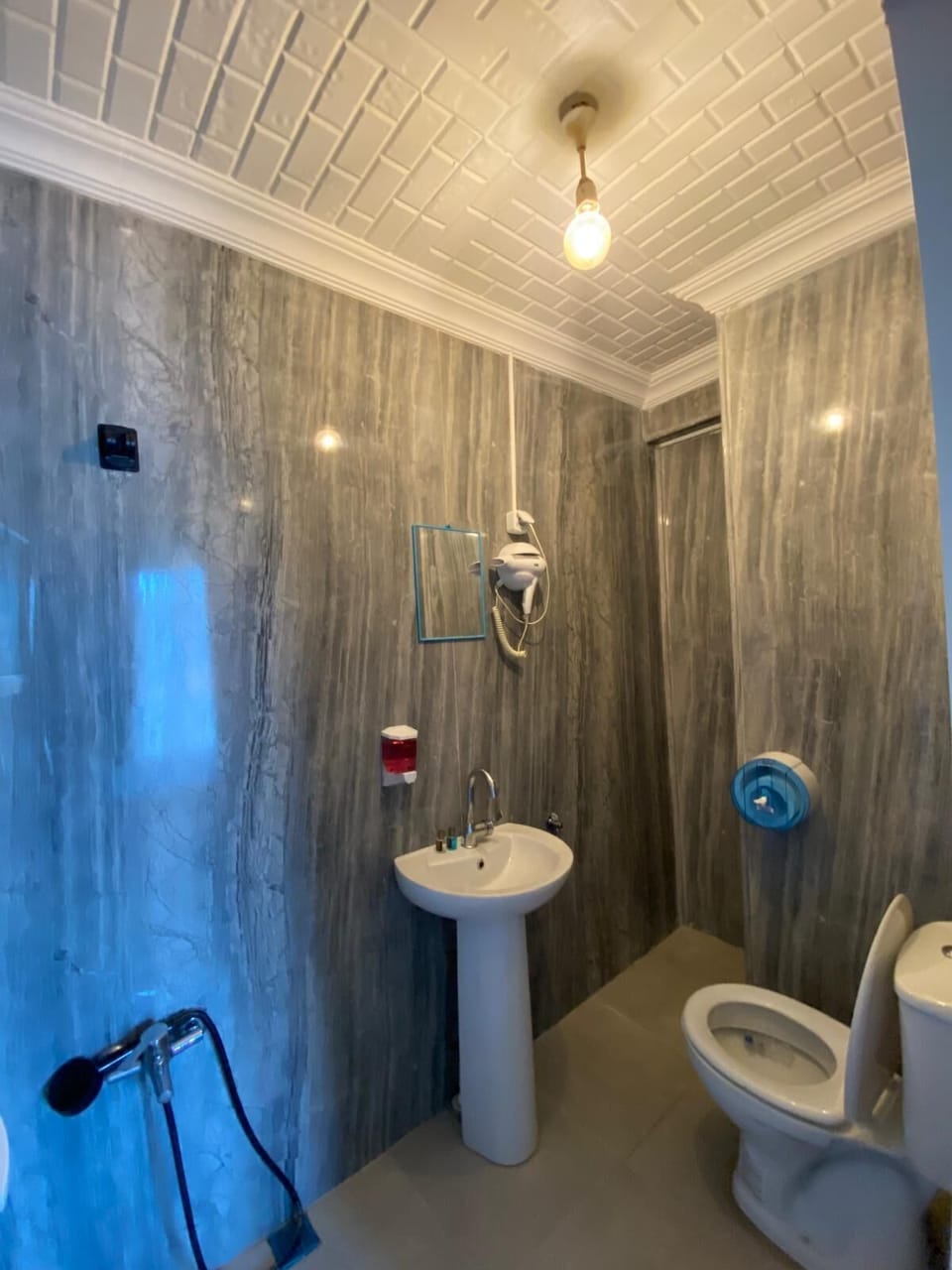 Basic Double Room, 1 Bedroom | Bathroom | Shower, free toiletries, hair dryer, slippers