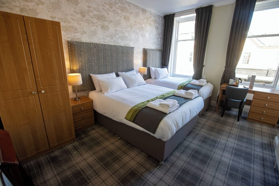 Family Room | Desk, iron/ironing board, free WiFi, bed sheets