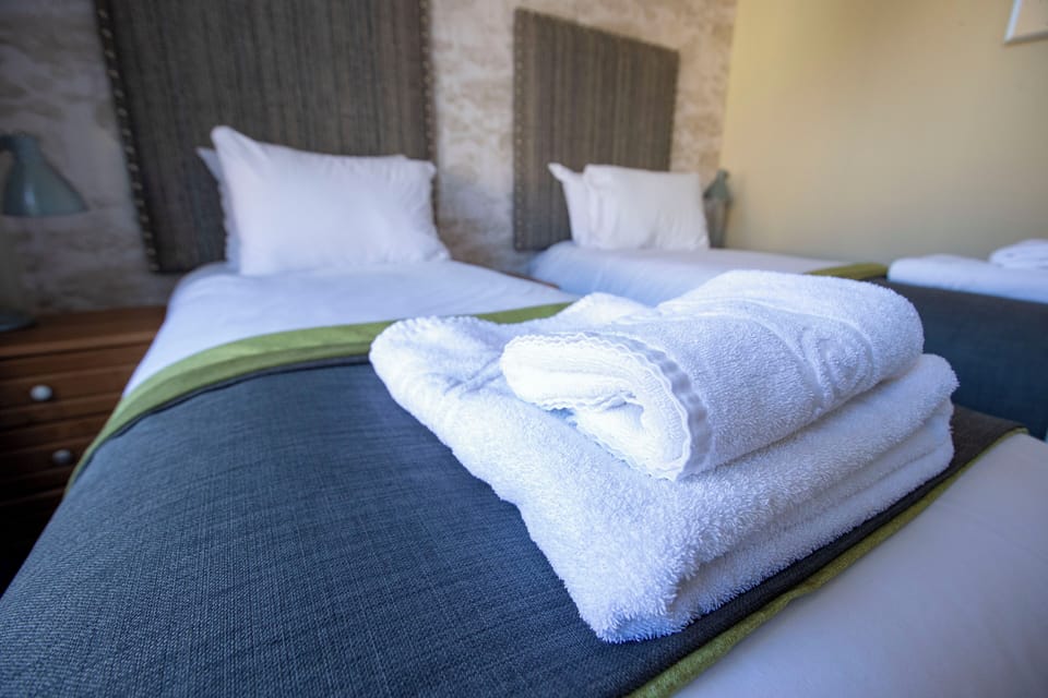 Desk, iron/ironing board, free WiFi, bed sheets