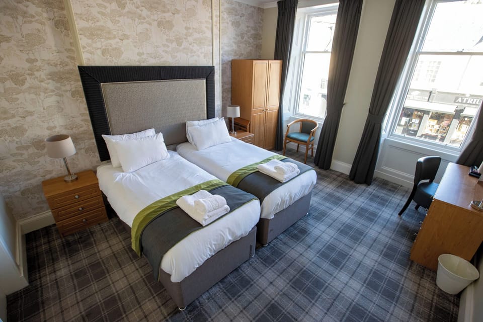 Twin Room | Desk, iron/ironing board, free WiFi, bed sheets