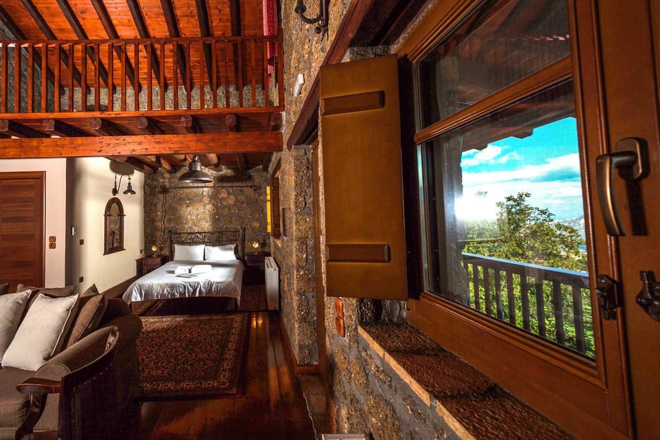 Suite (2 Adults & 2 Children) | Living area | 32-inch LCD TV with digital channels, TV