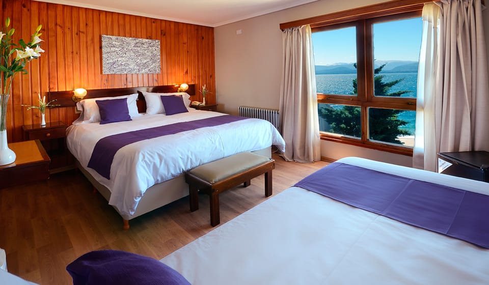 Suite, Multiple Beds, Lake View | In-room safe, desk, free WiFi, bed sheets