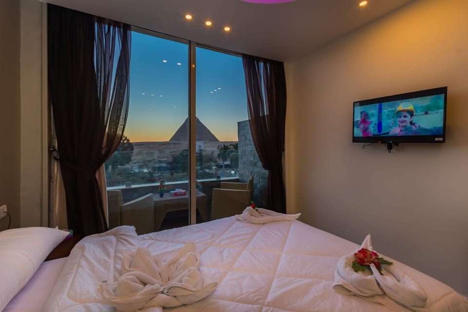 Luxury Double or Twin Room | Select Comfort beds, minibar, blackout drapes, iron/ironing board