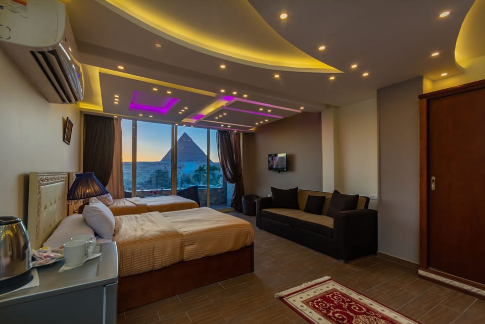 Luxury Suite | Select Comfort beds, minibar, blackout drapes, iron/ironing board