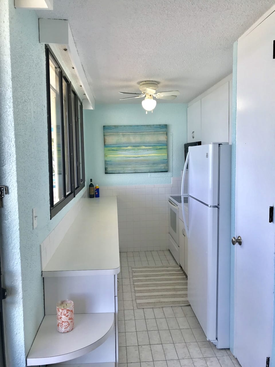 Fully equipped kitchen with brand new fridge, microwave, and all cookware