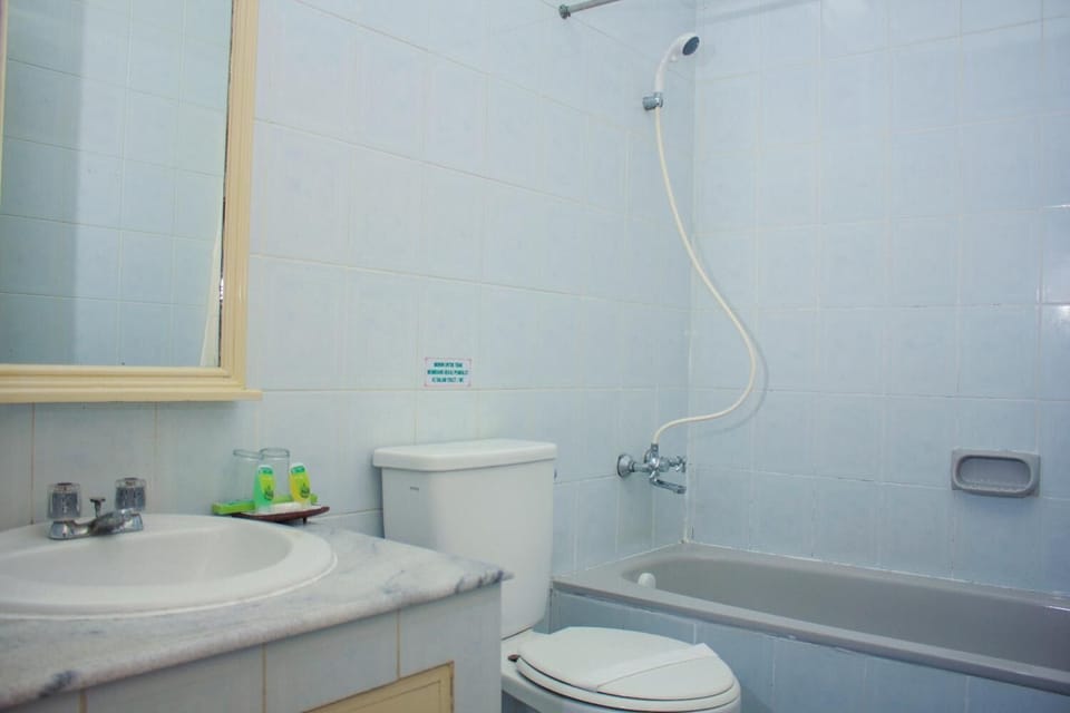 Shower, free toiletries, slippers, towels