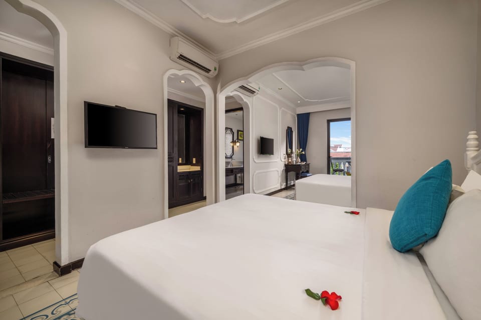 Family Quadruple Room, Multiple Beds, Bathtub, City View | Down comforters, minibar, in-room safe, individually decorated