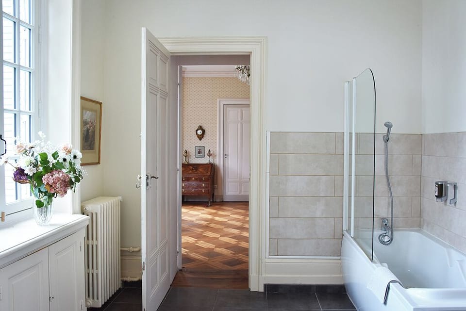 Family Suite (Gabrielle) | Bathroom | Hair dryer, bathrobes, slippers, towels