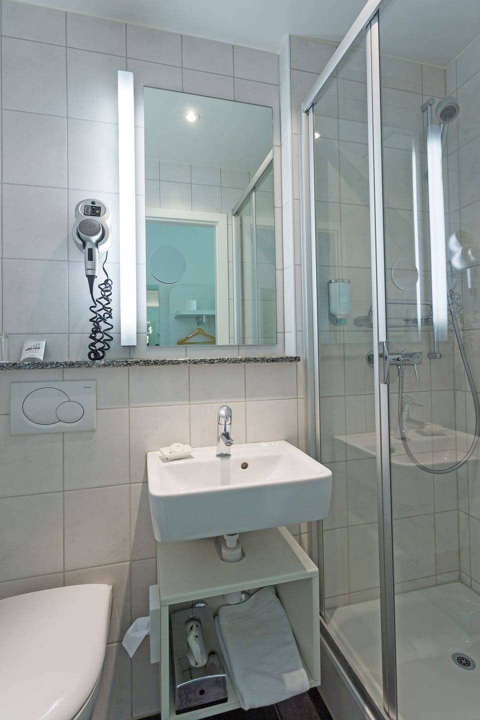 Shower, free toiletries, hair dryer, towels