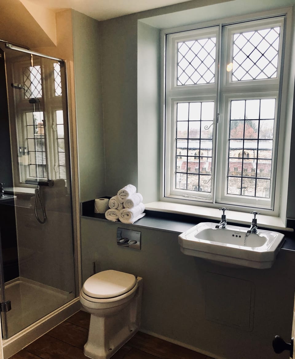 Luxury Room, 1 King Bed | Bathroom | Shower, rainfall showerhead, designer toiletries, hair dryer