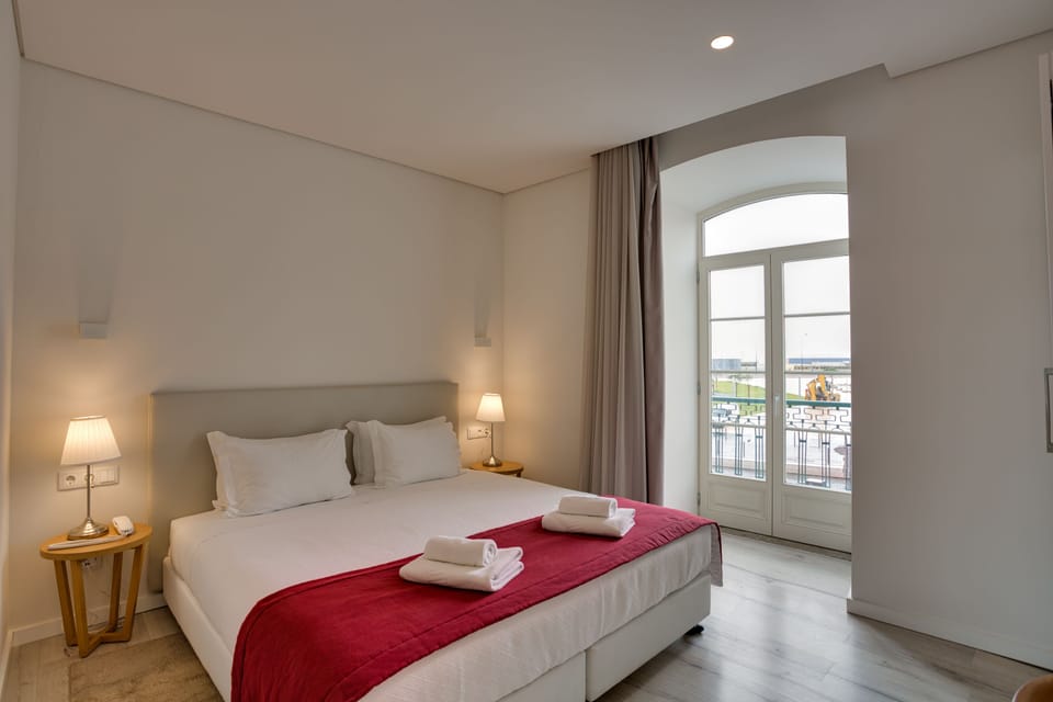 Superior Double or Twin Room | Minibar, in-room safe, desk, laptop workspace