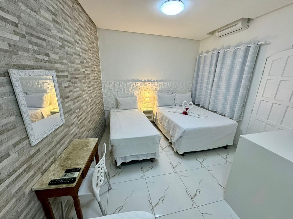 Family Quadruple Room | Free cribs/infant beds, free WiFi, bed sheets