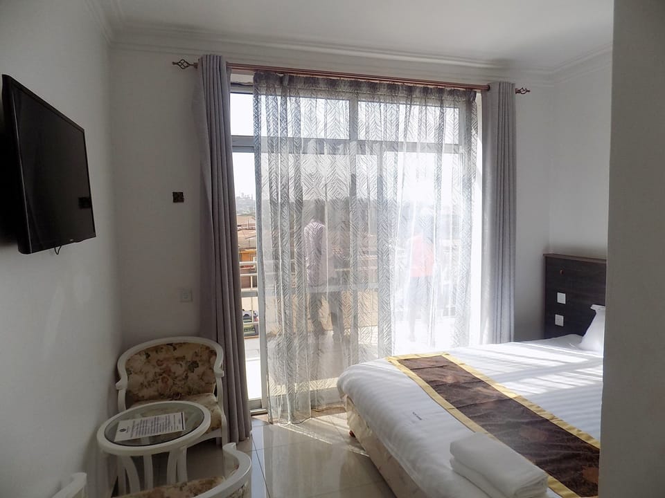 Double Room | Living area | Flat-screen TV