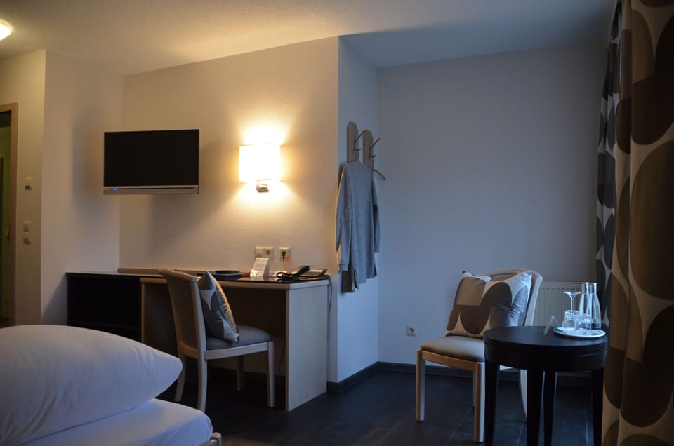 Double Room | Living area | Flat-screen TV