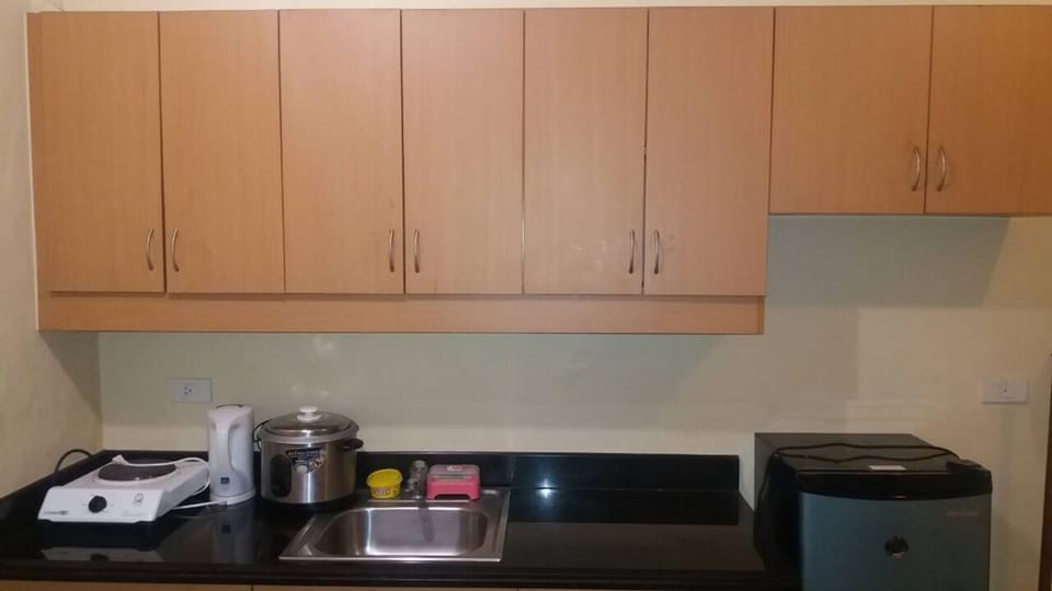 Suite, 2 Bedrooms | Private kitchenette | Full-size fridge, microwave, stovetop, electric kettle