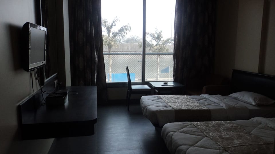 Premium bedding, desk, laptop workspace, iron/ironing board (on request)
