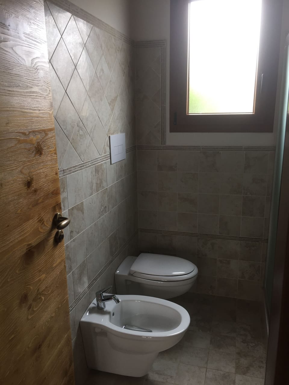 Shower, rainfall showerhead, hair dryer, towels