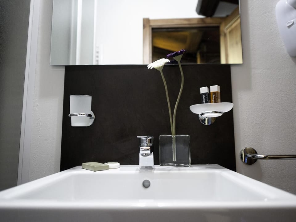 Quadruple Room | Bathroom | Shower, deep soaking tub, free toiletries, hair dryer