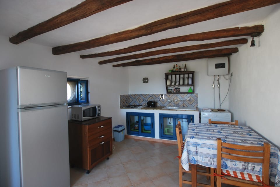 Villa, 1 Bedroom | Private kitchen | Full-size fridge, microwave, stovetop, electric kettle