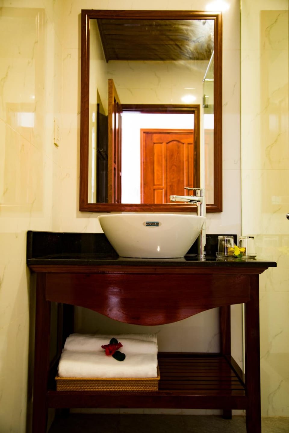 Shower, free toiletries, hair dryer, slippers