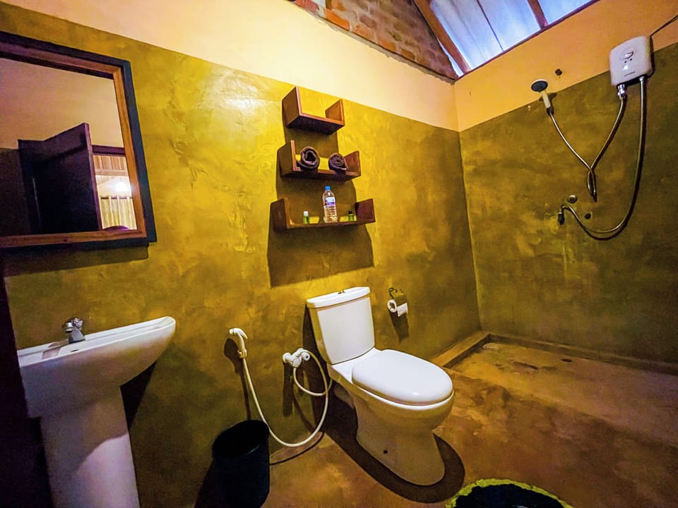 Shower, rainfall showerhead, towels, shampoo