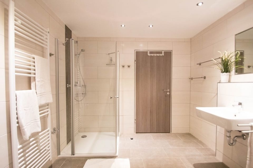 Apartment, 3 Bedrooms | Bathroom | Shower, free toiletries, hair dryer, towels