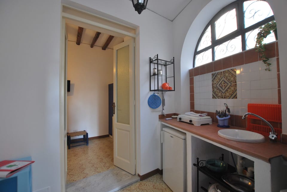 Apartment, 1 Bedroom | Private kitchenette | Fridge, stovetop, cookware/dishes/utensils